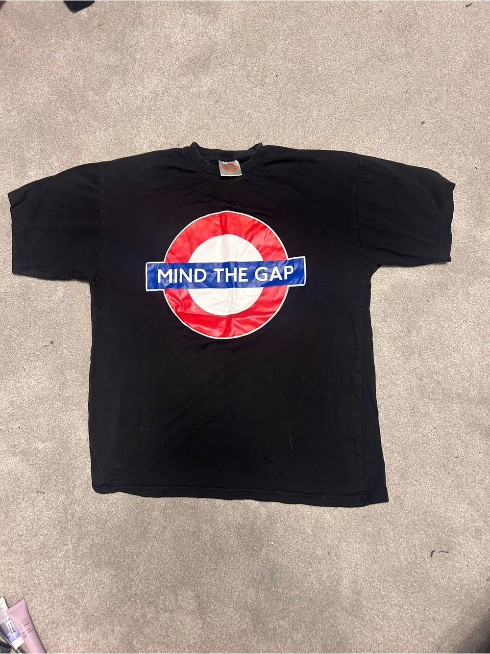 Underground Black Tee with Orange Tag and Red Graphic